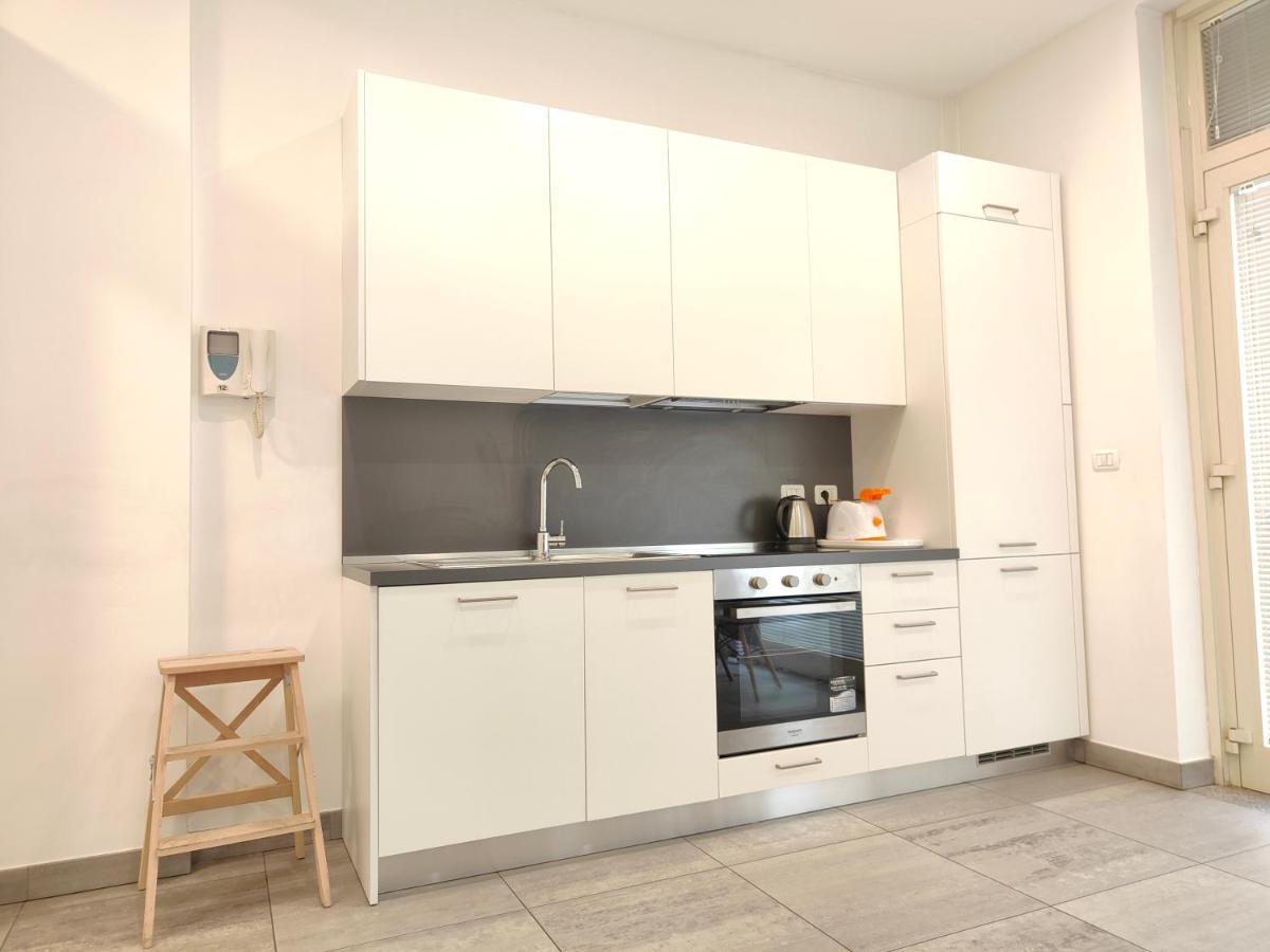 Hostdomus - Terry Suite Turin Bagian luar foto